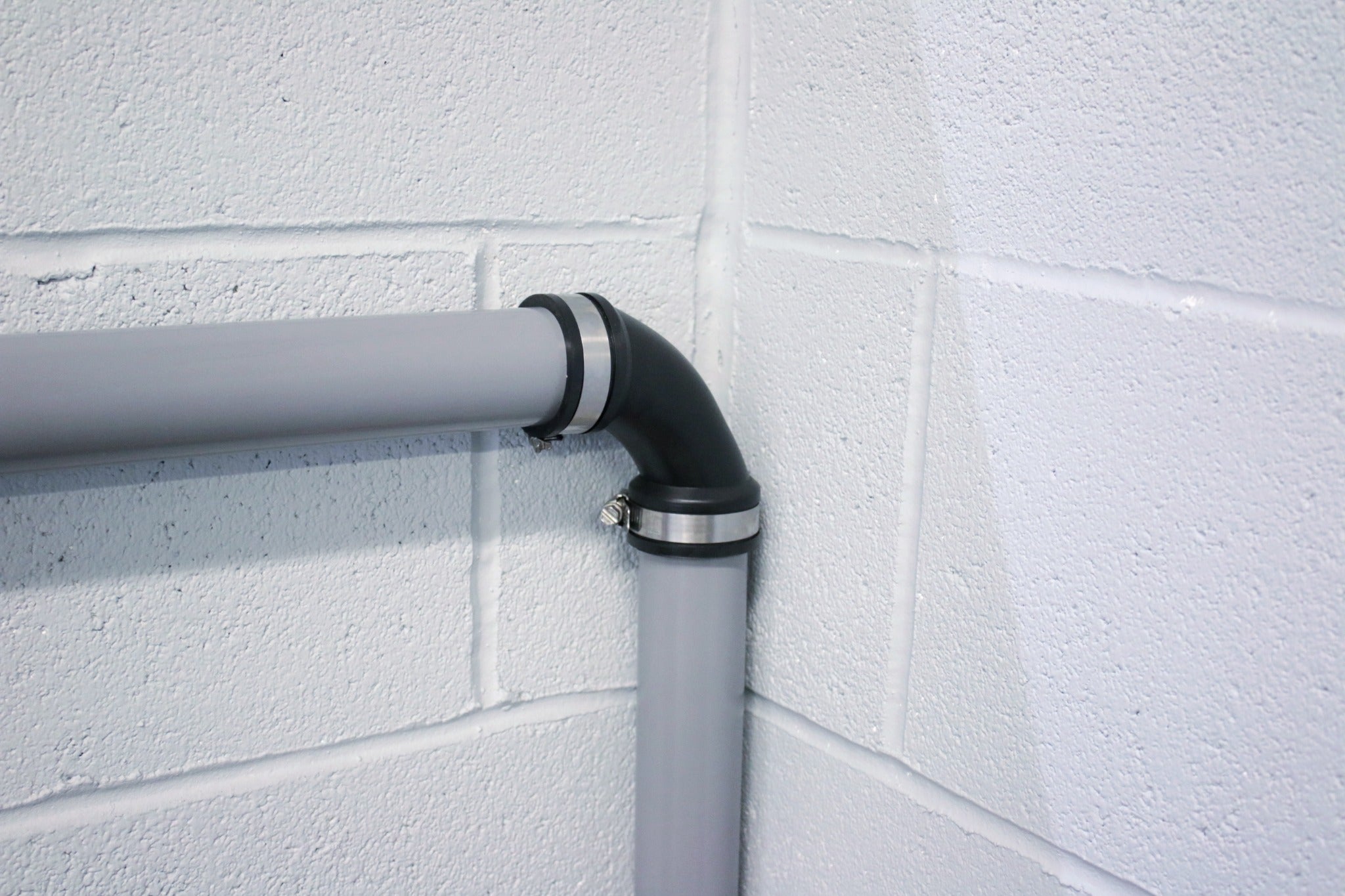 Fernco EPDM elbow installed vertically