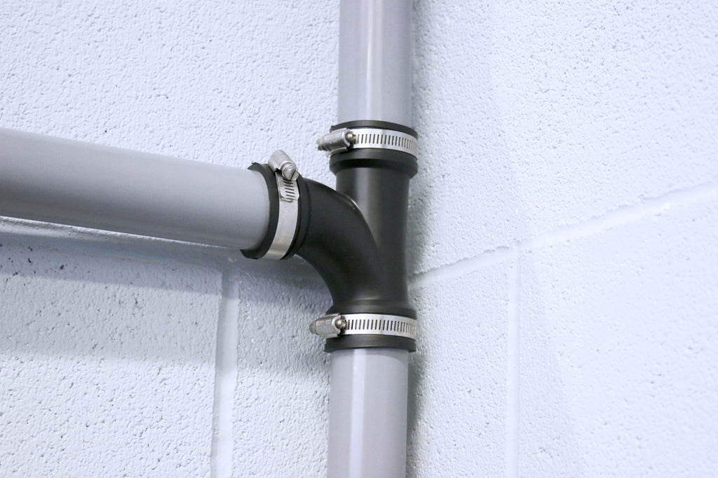 Fernco EPDM tee coupling installed on pipe