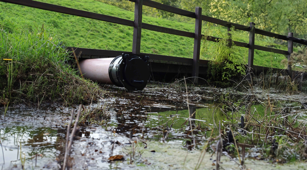 Fernco spigot mounted flap valve installed on a pipe