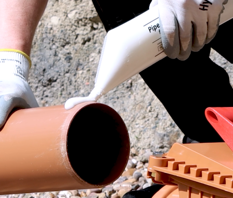 Fernco Pipe Lubricant being applied to a pipe
