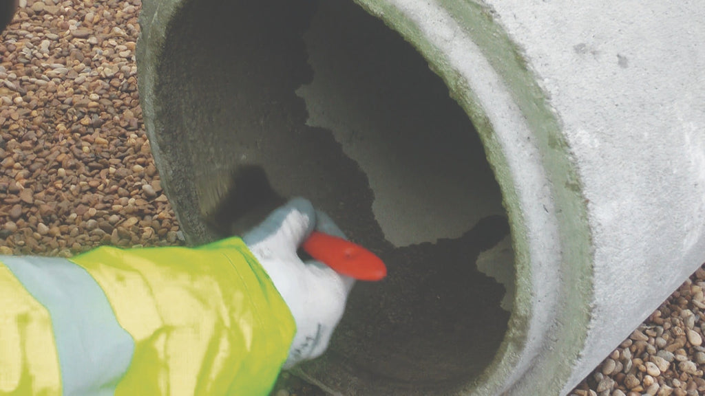 Fernco Pipe Lubricant applied to a concrete pipe