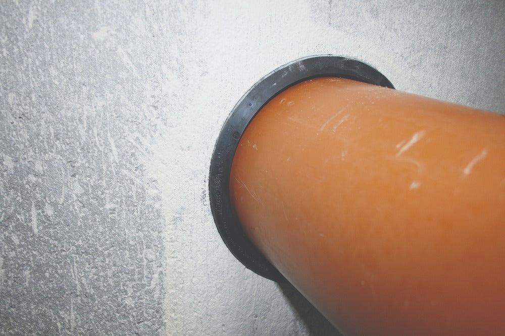 Fernco wall seal installed in concrete